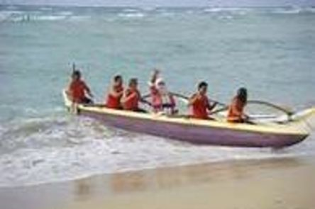 Santa arrives in a canoe for Christmas on Kauai 2012